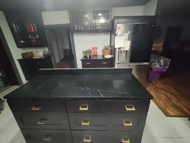 670 Wauregan Rd, Brooklyn, CT 06234 - kitchen with stainless steel fridge with ice dispenser and a kitchen island