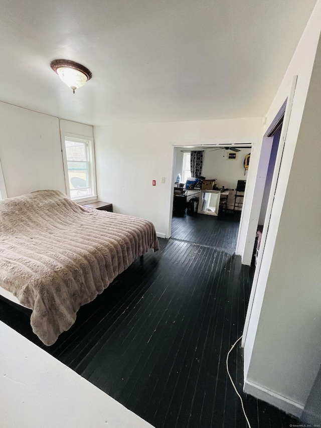 670 Wauregan Rd, Brooklyn, CT 06234 - bedroom with dark wood-style flooring