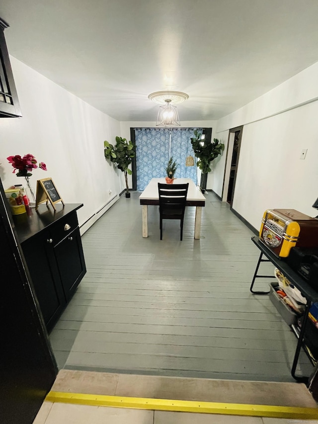 670 Wauregan Rd, Brooklyn, CT 06234 - dining area featuring a baseboard heating unit