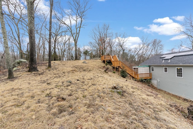 view of yard with a deck