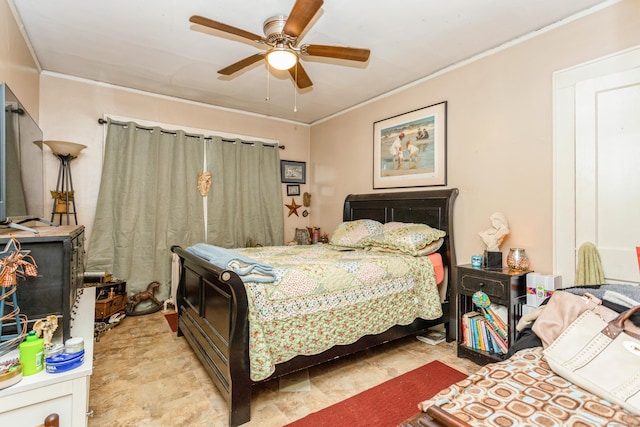 bedroom with ceiling fan and crown molding