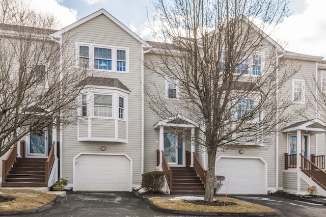 view of front of property with a garage and driveway