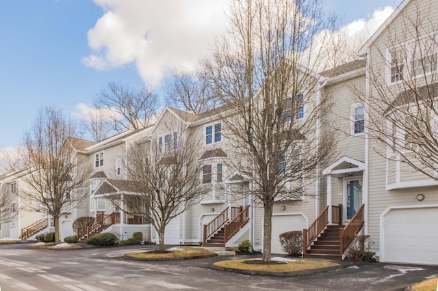 view of front of property with aphalt driveway