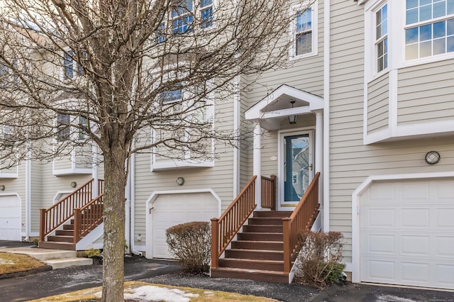 doorway to property featuring a garage