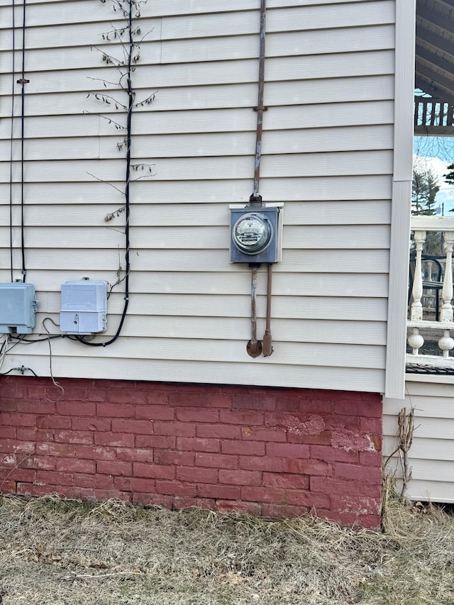 exterior details featuring electric meter