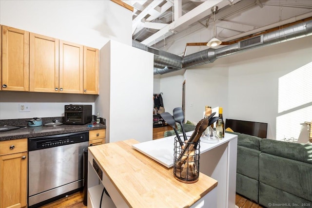 kitchen with wood counters, visible vents, open floor plan, dishwasher, and light brown cabinetry