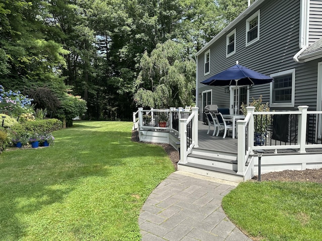 view of yard featuring a deck