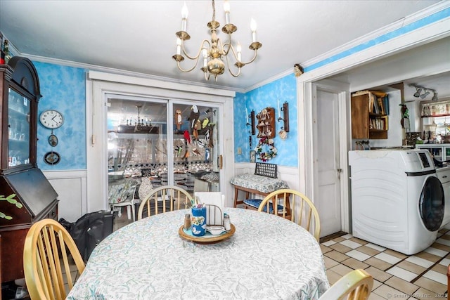 dining room featuring wallpapered walls, ornamental molding, an inviting chandelier, and wainscoting