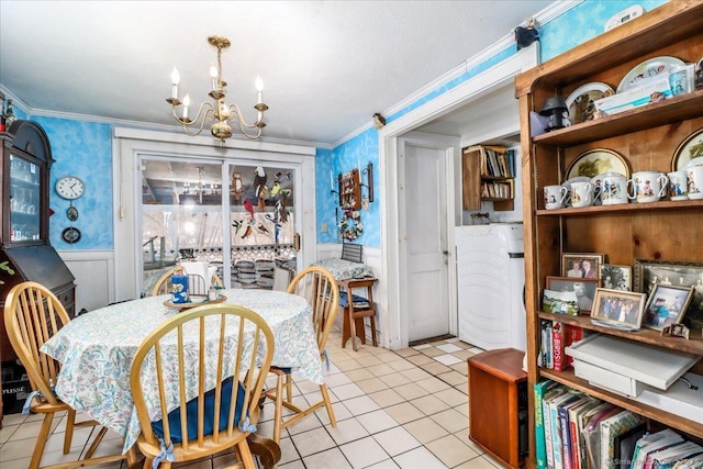 tiled dining space with ornamental molding, wainscoting, an inviting chandelier, and wallpapered walls