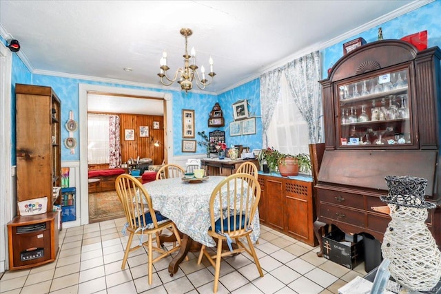 dining area featuring ornamental molding, a chandelier, wallpapered walls, and light tile patterned floors