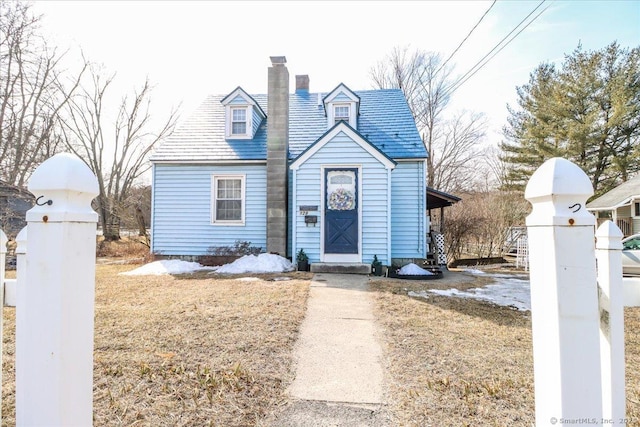 view of front of house with a chimney