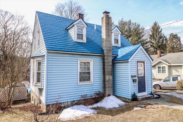 view of front of home with a chimney