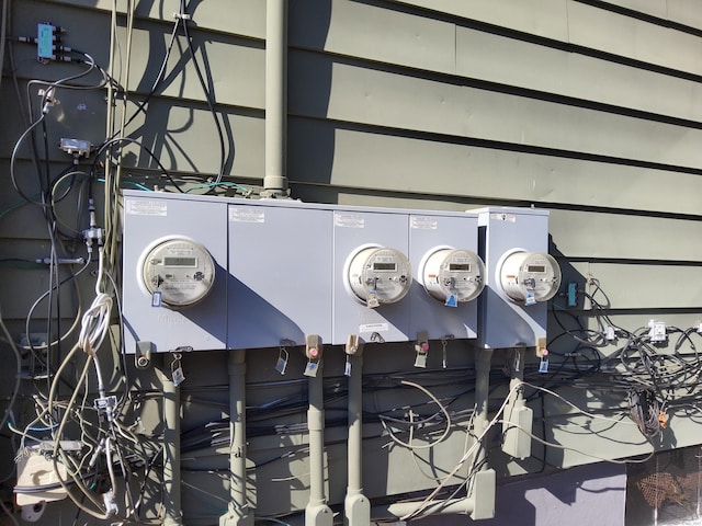 exterior details featuring electric meter