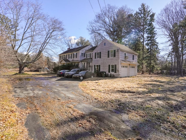 view of home's exterior with an attached garage