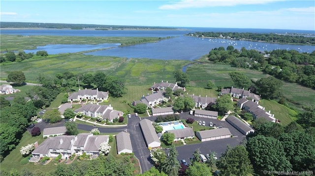 aerial view with a water view and a residential view