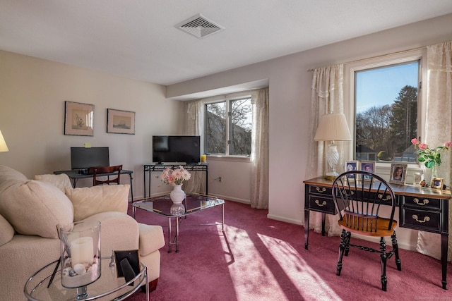 interior space with visible vents, baseboards, and carpet