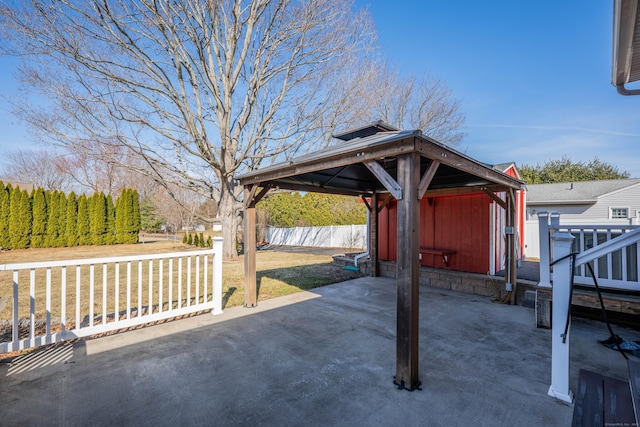 view of patio featuring a gazebo and fence