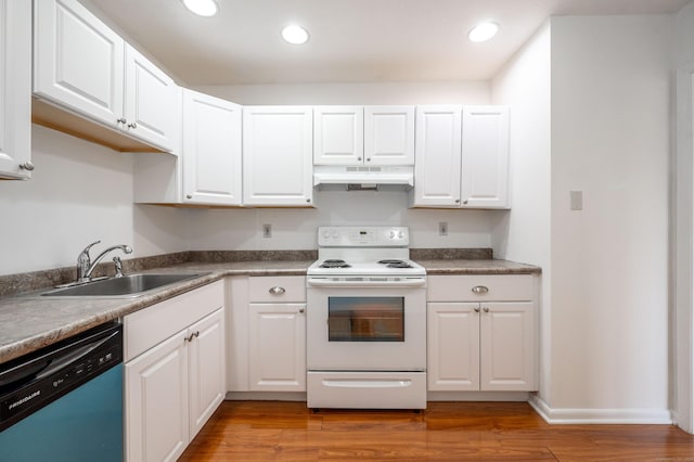 kitchen featuring electric range, light wood-style floors, dishwasher, under cabinet range hood, and a sink