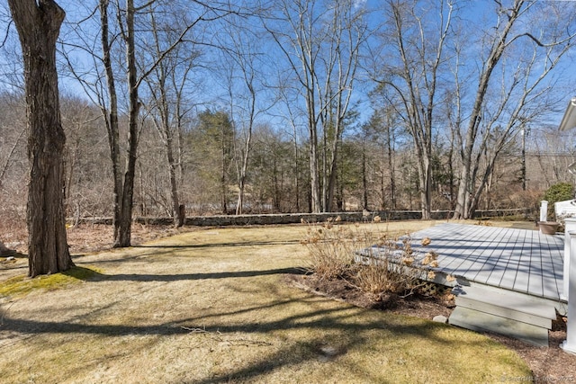 view of yard with a deck