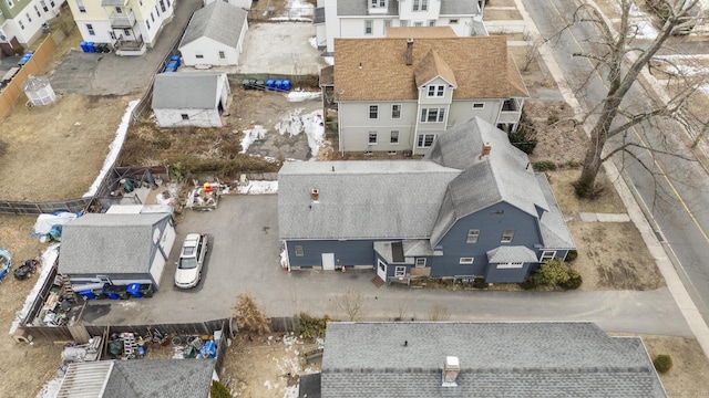 birds eye view of property with a residential view