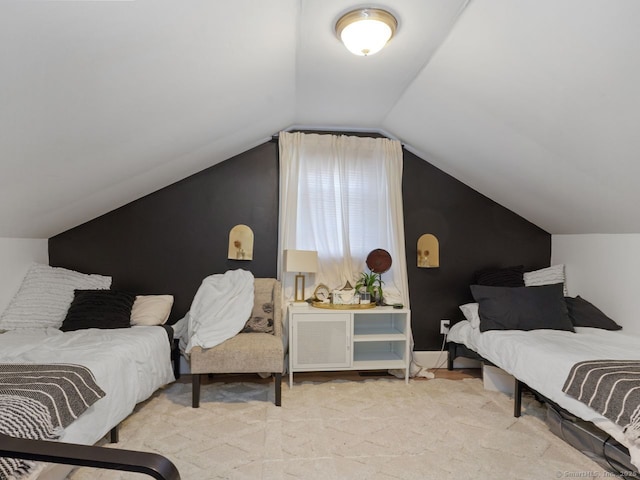 bedroom with vaulted ceiling