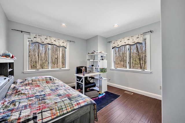 bedroom featuring recessed lighting, visible vents, baseboards, and dark wood-type flooring