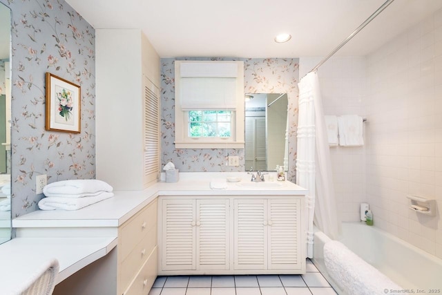 bathroom with shower / tub combo with curtain, tile patterned floors, vanity, and wallpapered walls