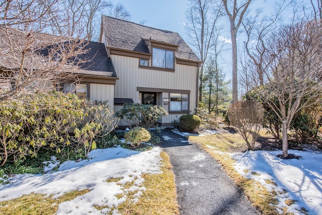 view of front of property with roof with shingles