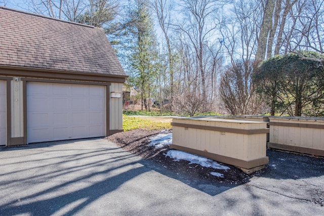 view of yard with a garage