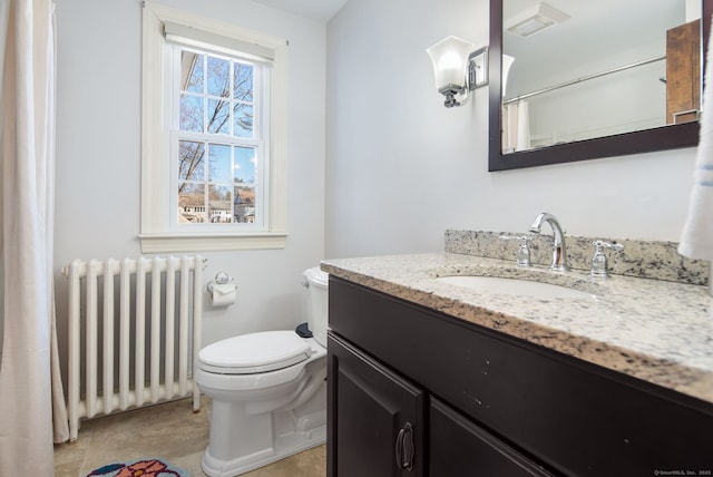 full bath featuring visible vents, toilet, radiator heating unit, vanity, and tile patterned flooring