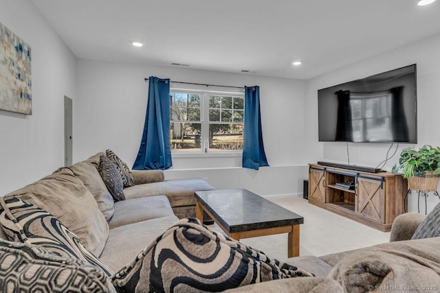 living area featuring carpet flooring, recessed lighting, baseboards, and visible vents