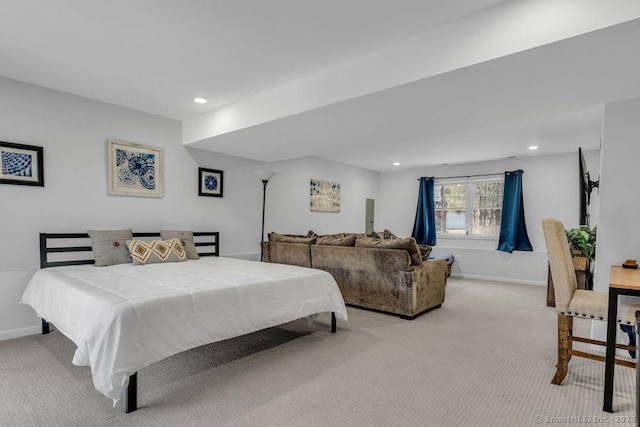 bedroom with light carpet, recessed lighting, and baseboards