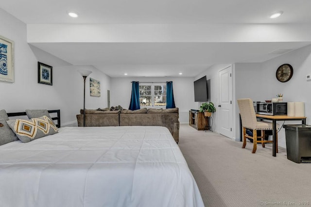 carpeted bedroom with recessed lighting and baseboards