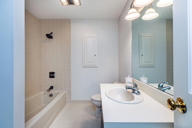 full bath with tile patterned floors, toilet, washtub / shower combination, baseboards, and vanity