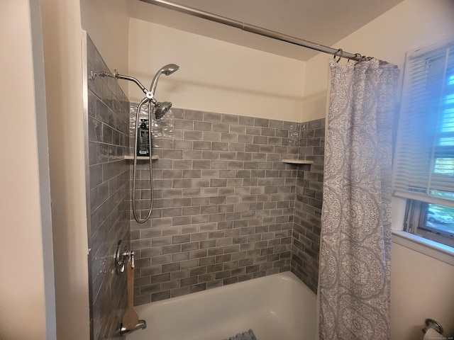 full bathroom featuring shower / bathtub combination with curtain