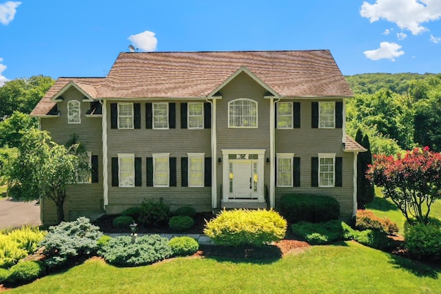 colonial house with a front yard