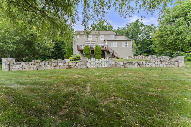 view of yard featuring a gate and fence