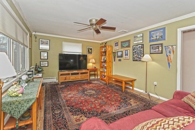 living room featuring ornamental molding, visible vents, baseboards, and a ceiling fan