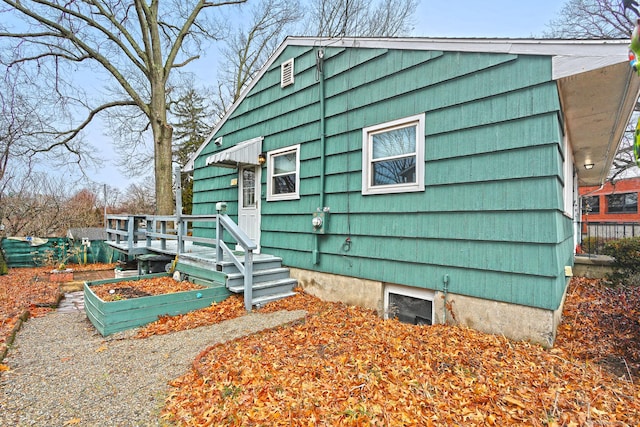 view of front of house featuring a vegetable garden