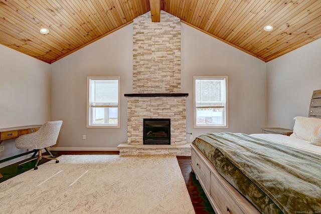 bedroom with baseboards, wood ceiling, a fireplace, high vaulted ceiling, and dark wood-style flooring