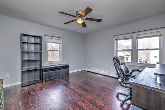 office area with a baseboard radiator, wood-type flooring, baseboards, and ceiling fan