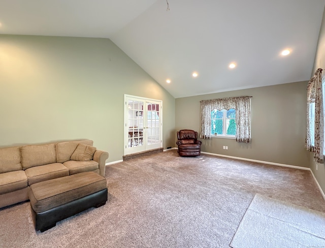 carpeted living room with high vaulted ceiling, recessed lighting, and baseboards