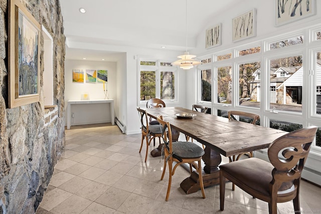 sunroom featuring a baseboard radiator