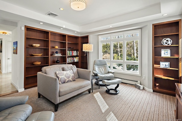 living area with recessed lighting, baseboards, visible vents, and baseboard heating