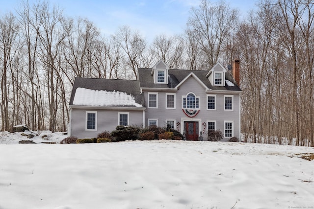 view of front of property featuring a chimney