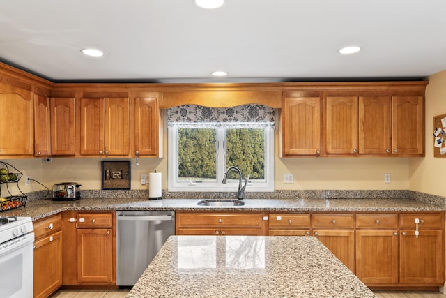 kitchen with dishwasher, stone counters, and a sink