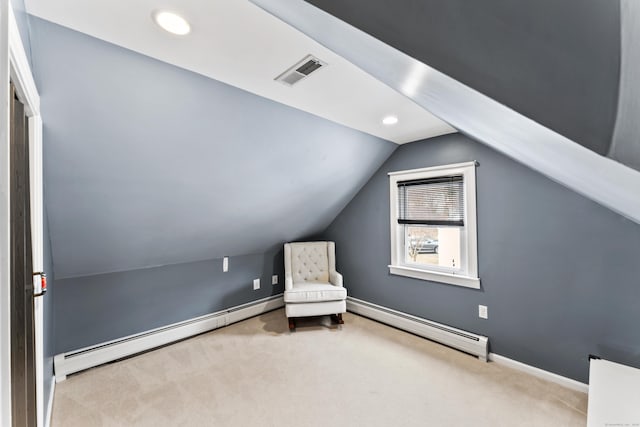 unfurnished room with lofted ceiling, recessed lighting, visible vents, baseboards, and carpet