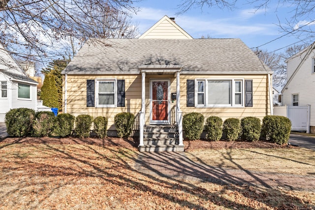 view of front of home featuring a shingled roof