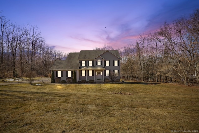 view of front of home with a lawn