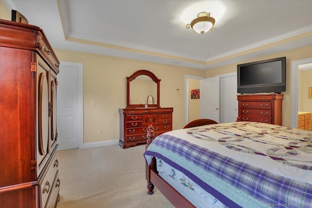 bedroom featuring a raised ceiling, light carpet, crown molding, and baseboards